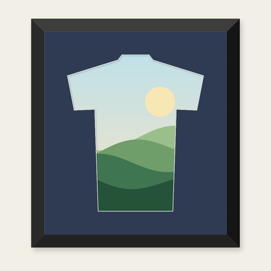 A picture in a T-shirt shaped opening in a navy mount and a black frame