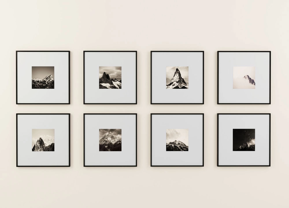 Gallery wall featuring various standard photo frames