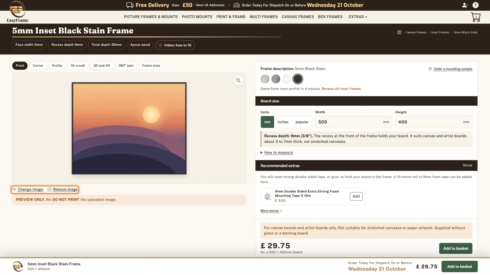 The sample sunset artwork shown in the black frame, with the Change image and Remove image links highlighted.
