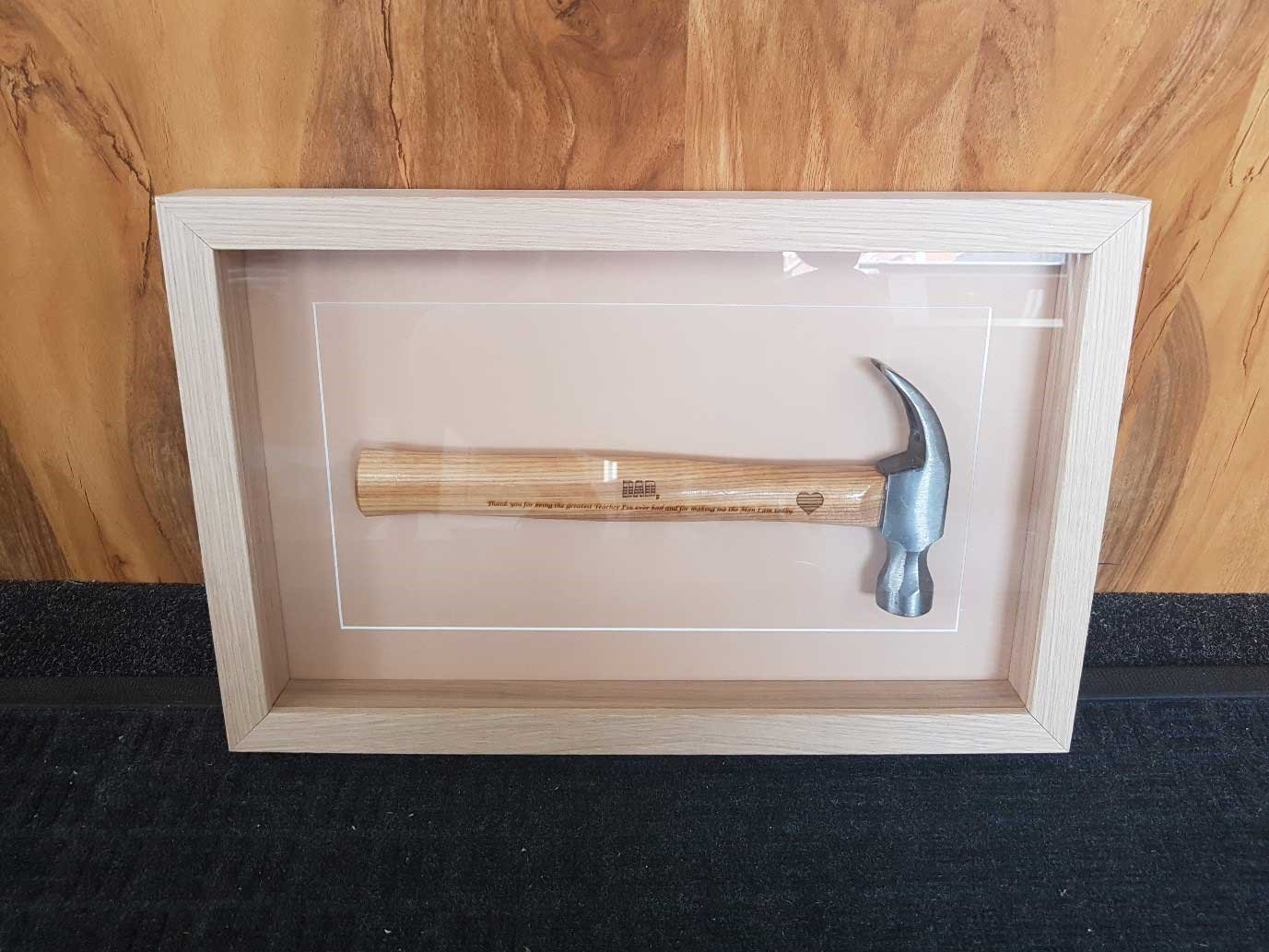 Picture of framed claw hammer
